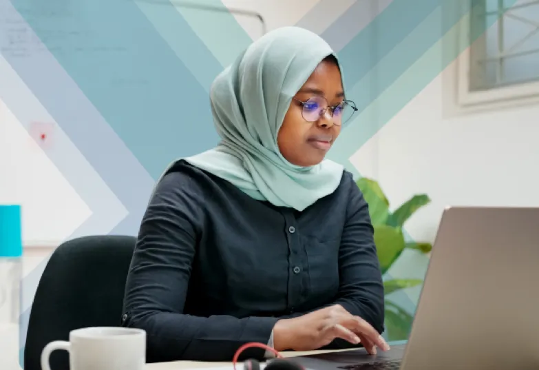 A woman working on a laptop