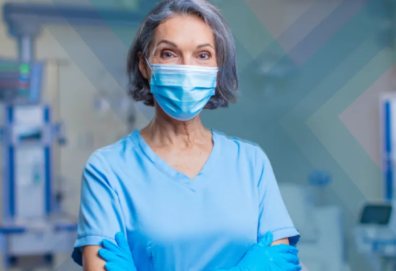 A healthcare professional wearing scrubs and a mask