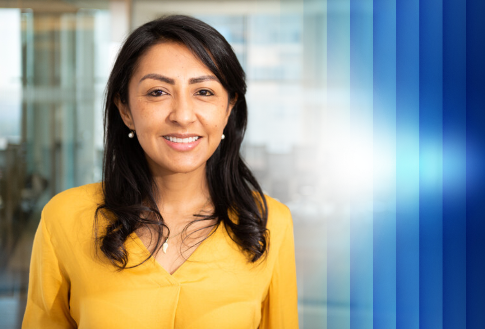Woman in yellow shirt smiling