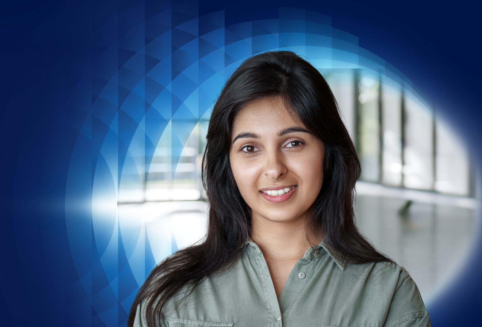 Baxter employee with blue shirt smiling