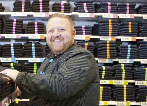 Paul working in a Primark store