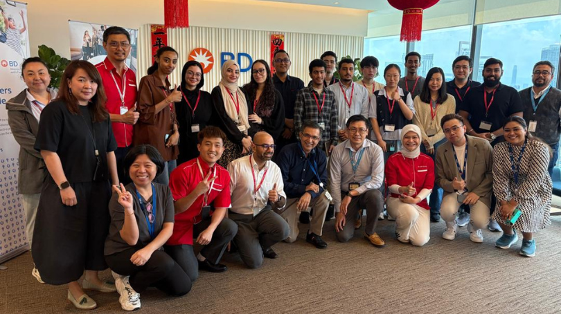 BD associates gathered at a workplace event in Malaysia.