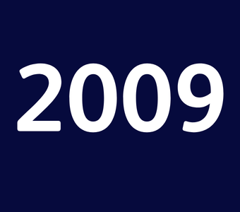 The year &ldquo;2009&rdquo; displayed in white text on a dark blue background.