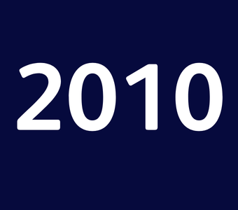 The year &ldquo;2010&rdquo; displayed in white text on a dark blue background.