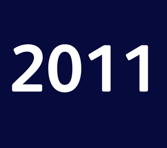 The year &ldquo;2011&rdquo; displayed in white text on a dark blue background.