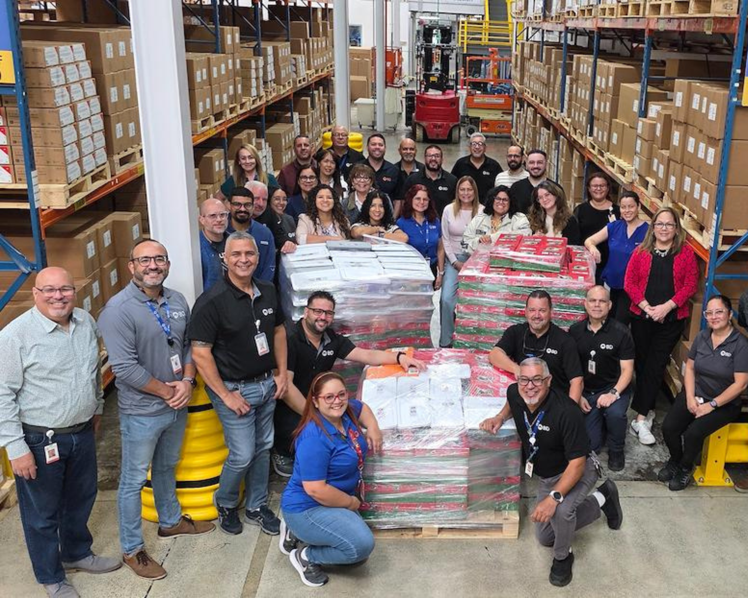 Large group of BD associates during Christmas Box for Children event at BD Anasco site