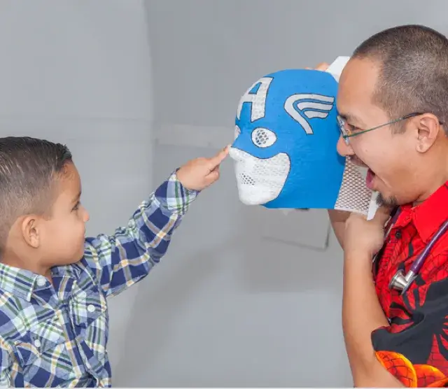 nurse and patient playing together