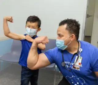 Kid Taking Training with the Trainer