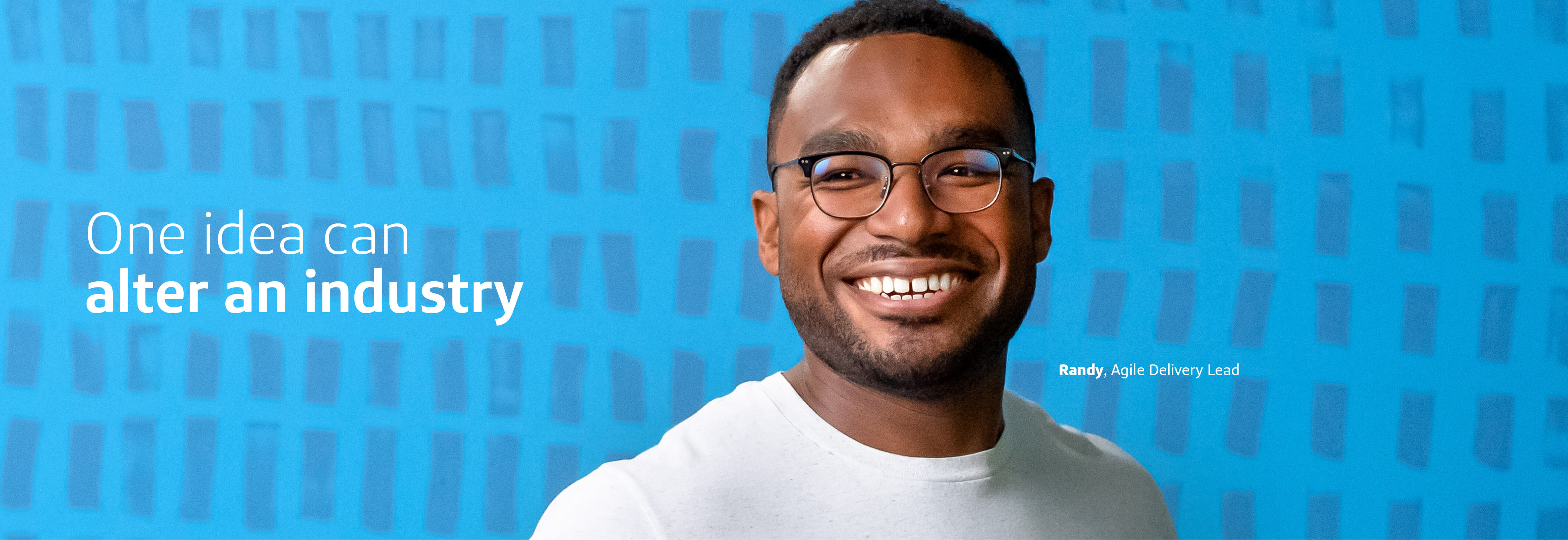 Randy, Capital One Agile Delivery Lead, stands in front of a textured blue background with a quote that says "One idea can alter an industry"