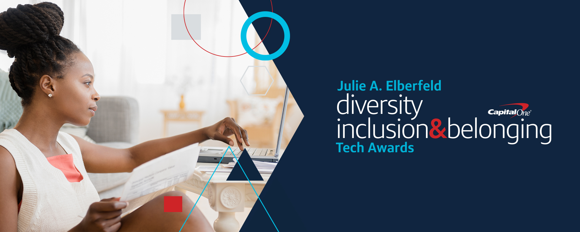Woman sits at laptop and talks about the Julie A. Elberfeld Tech Diversity and Inclusion awards at Capital One