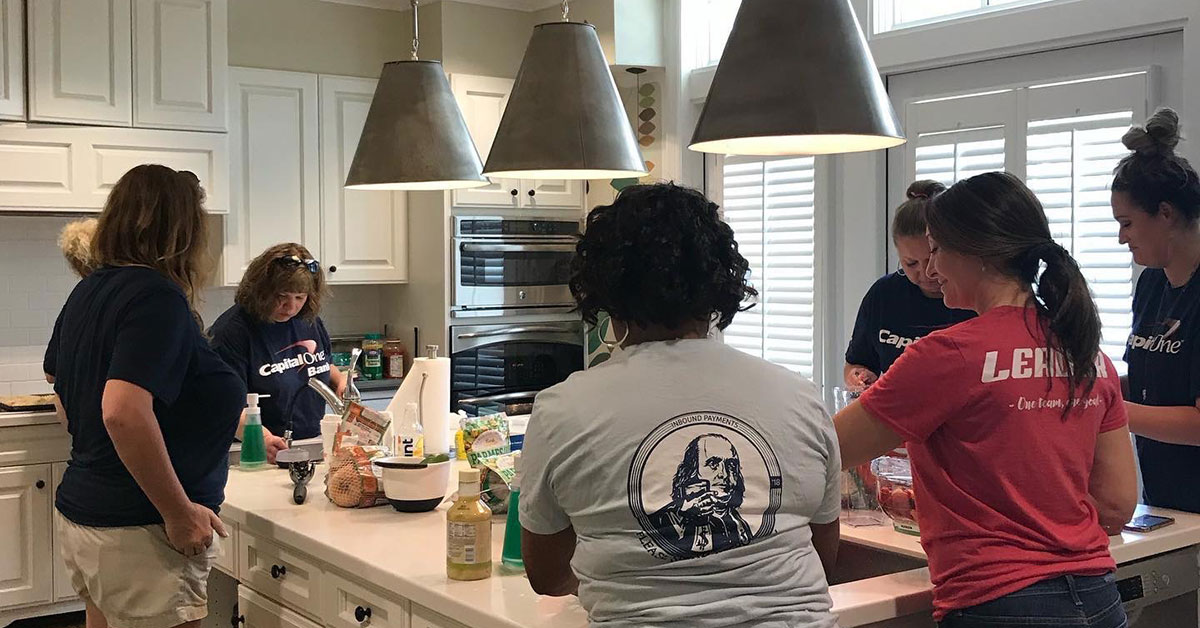 Capital One Inbound Payments process team volunteer event at cleaning and cooking for house guests staying at house guests staying at Evelyn D. Reinhart Guest House