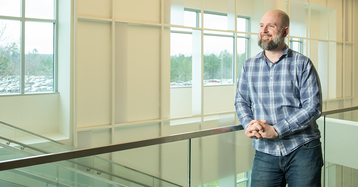 Chris, Senior Distinguished Engineer at Capital One, talks about growing through mentorship in Tech