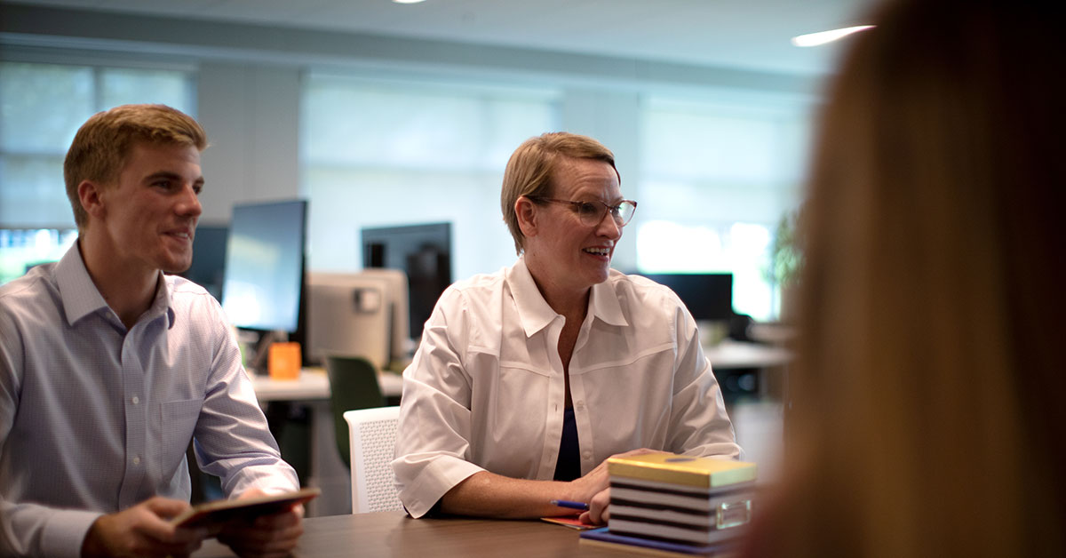 woman leading a stand-up meeting