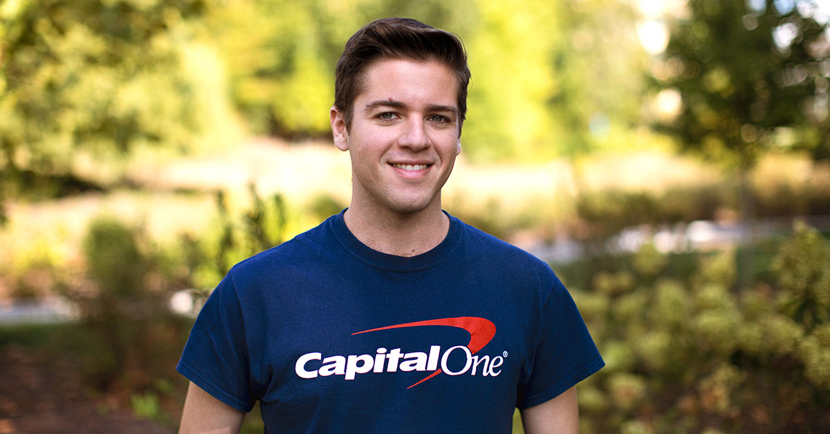 tech recruiter standing outside in capital one shirt