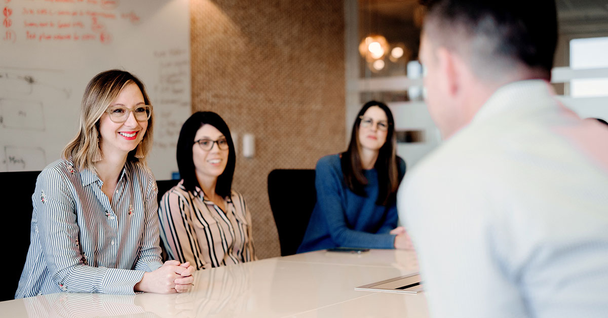 kristen przano working with others at a desk