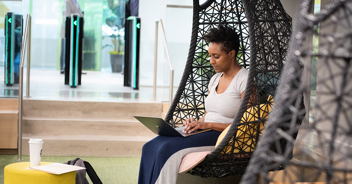 woman working on a computer in a mobile workspace