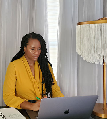 Woman working at home on a laptop