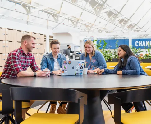 employees having a meeting at a table