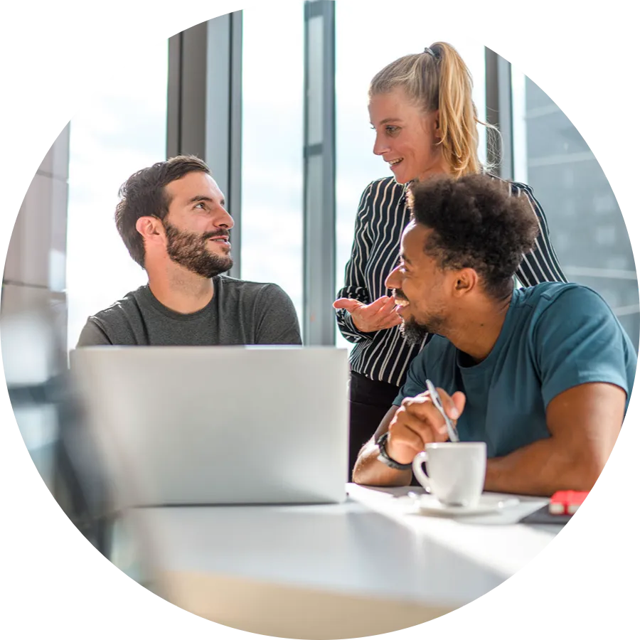 Three employee discussing