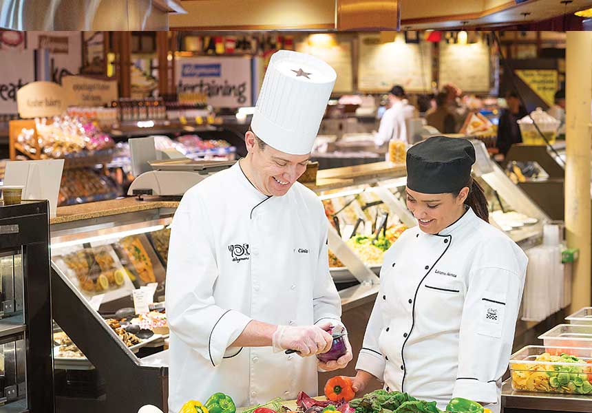 Chefs cutting vegetables