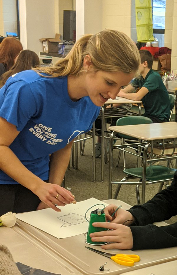 Hana volunteering at a company Engineers Week school event.