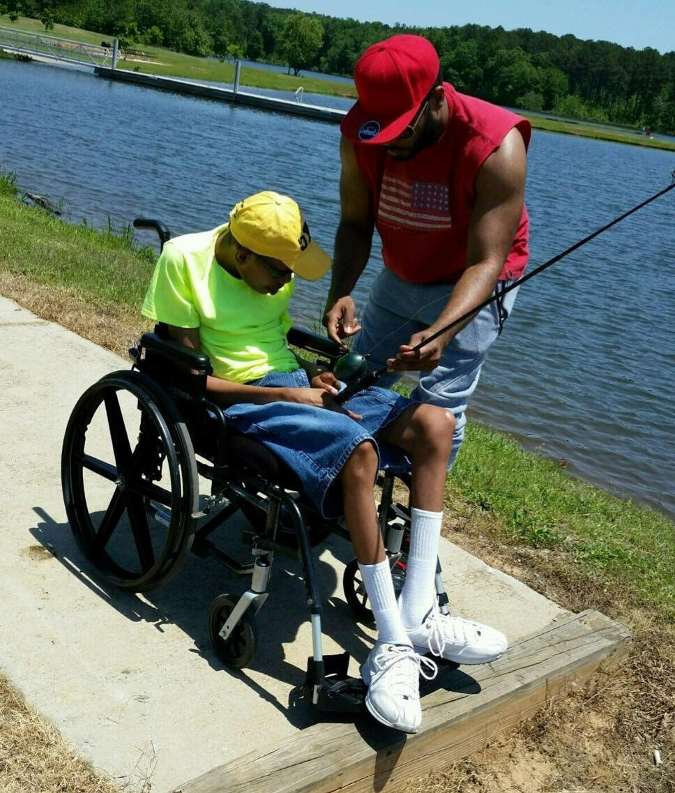 Perry fishing with his brother Jarvis. 
