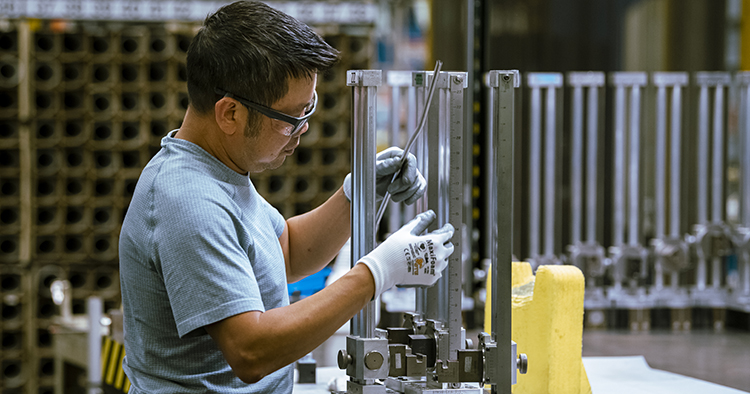 Man with protective glasses, working