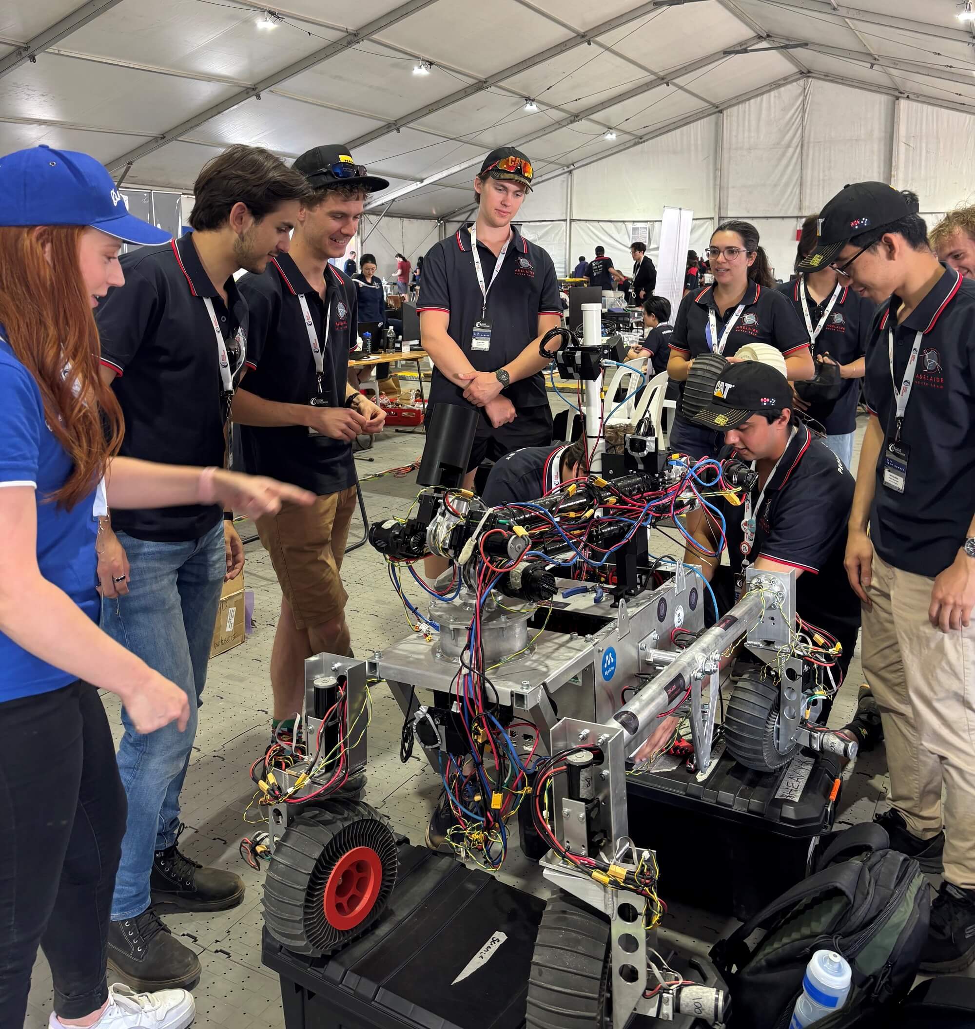 Group of people with robots.