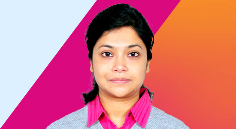 Antara in front of pink and orange background