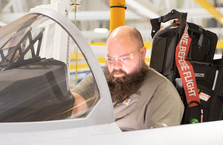 Man working in cockpit