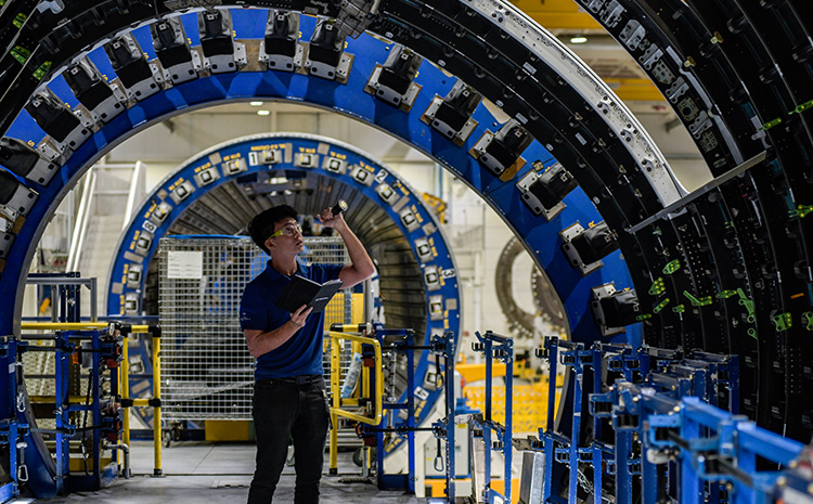 Employee working in fuselage
