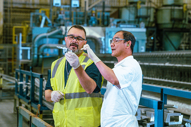 Two employees working together