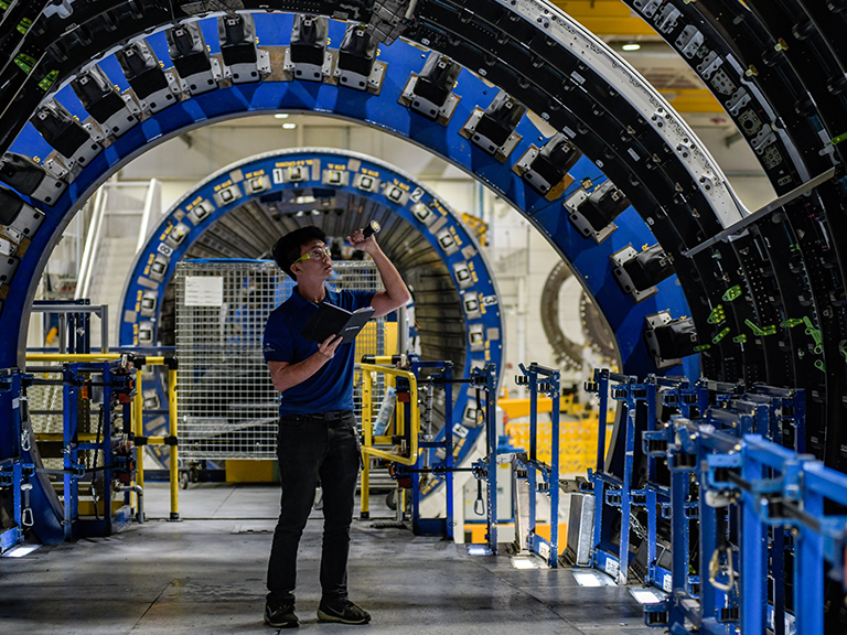 Employee in airplane fuselage