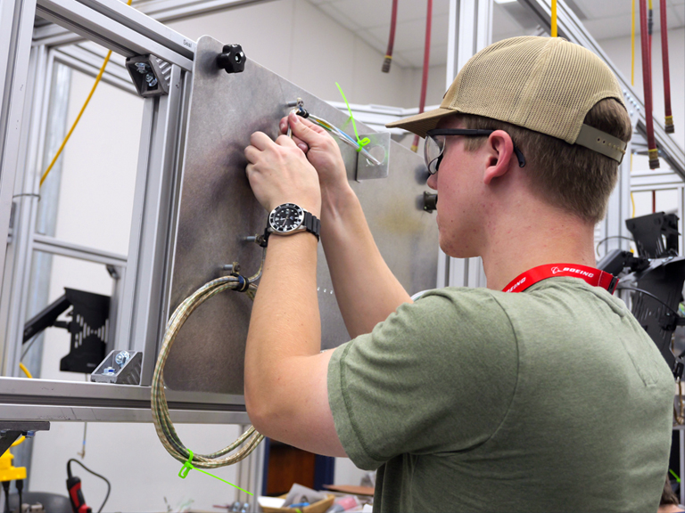 Employee working on machinery