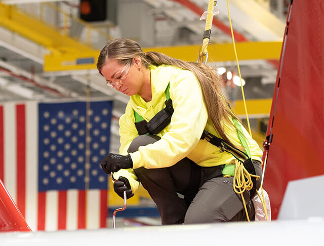 Employee working on plane