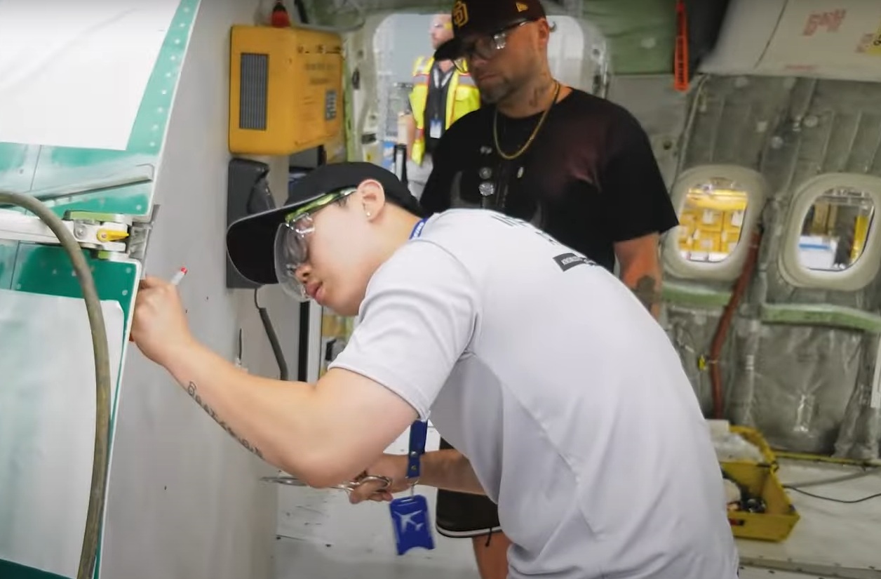 Employee working on aircraft