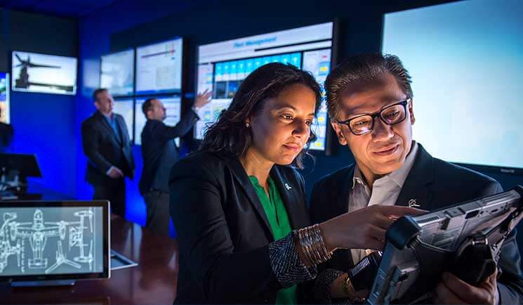 People looking at tablet