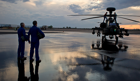 people looking at helicopter