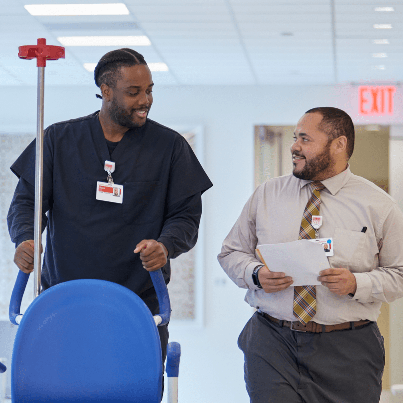 two workers in a hospital