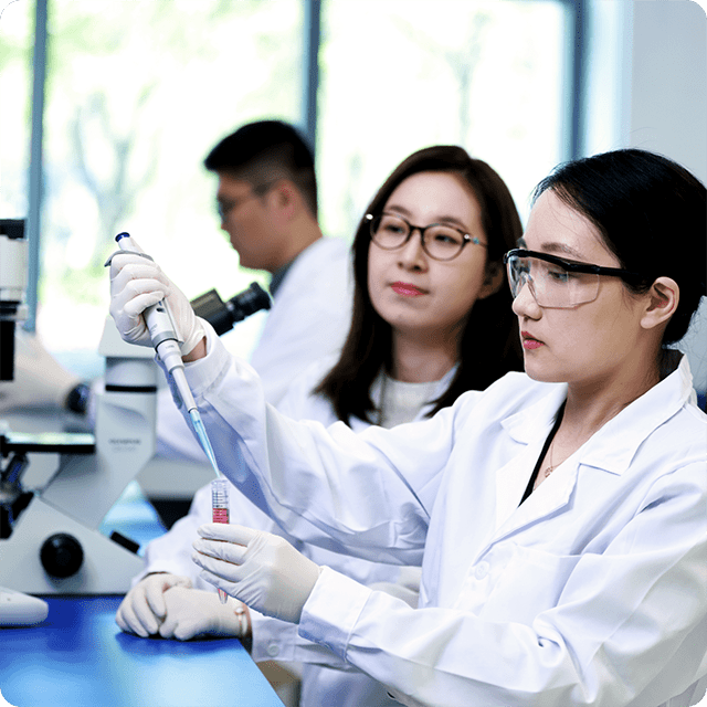 Scientists wearing lab coats