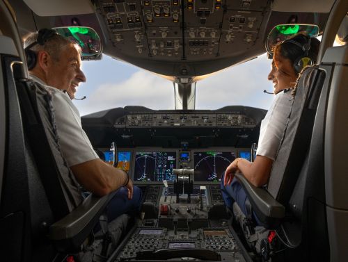 British Airways pilots smiling from the cockpit