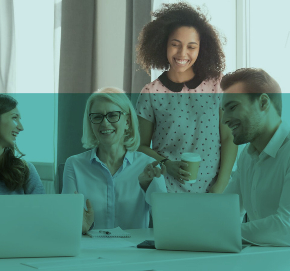 A diverse group of individuals smiling and engaging in conversation.