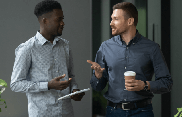 Two staff members chatting