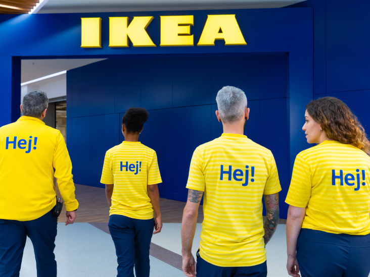 Four people stood outside IKEA store