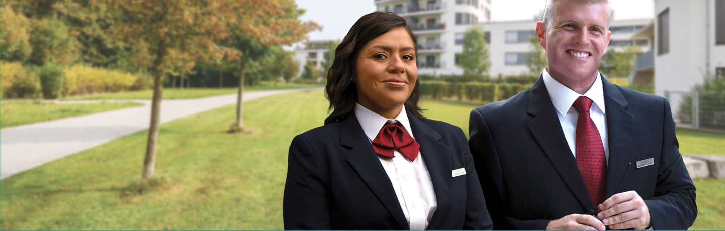 Two smiling security guards