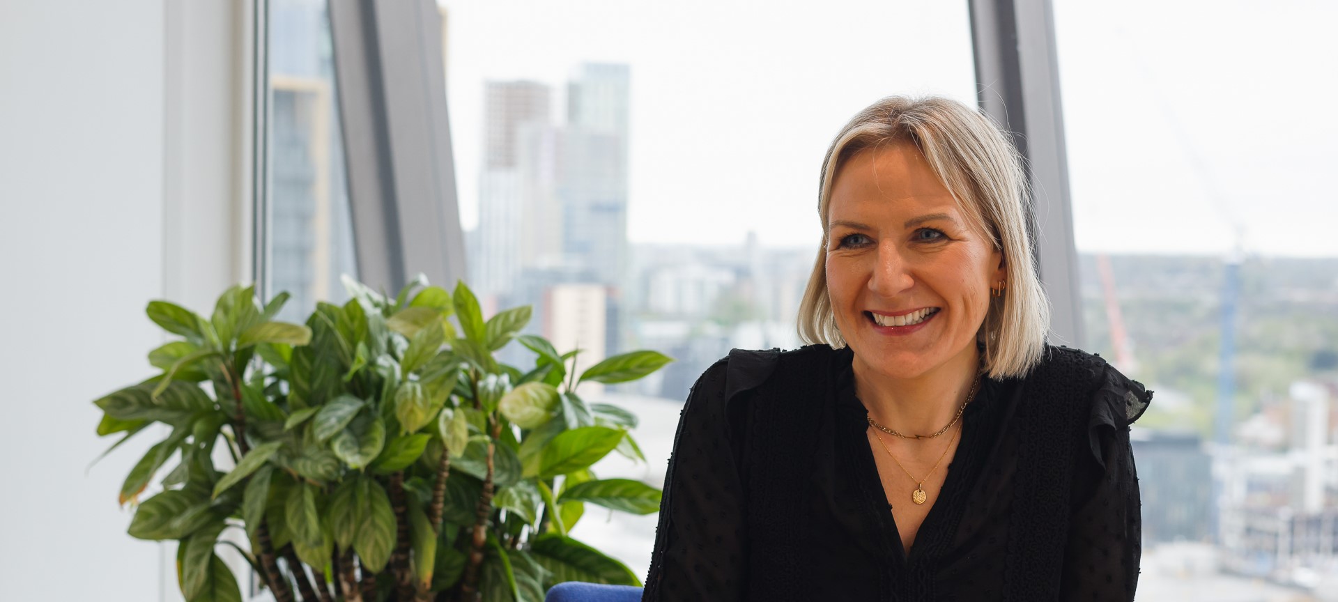 Co-op Wholesale leaders smiling at an event