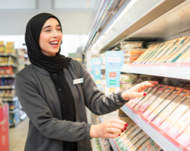 Woman smiling in a store