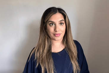 Aysha Khalid sharing her work story at office.