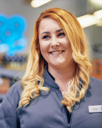 Woman smiling in a store