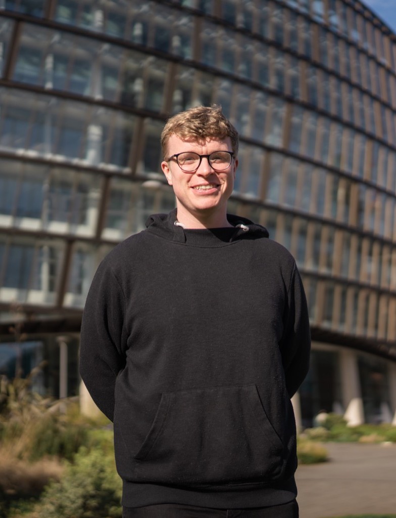 man with head office behind